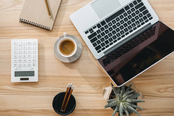 istock Top view of modern office workplace with laptop 696636230