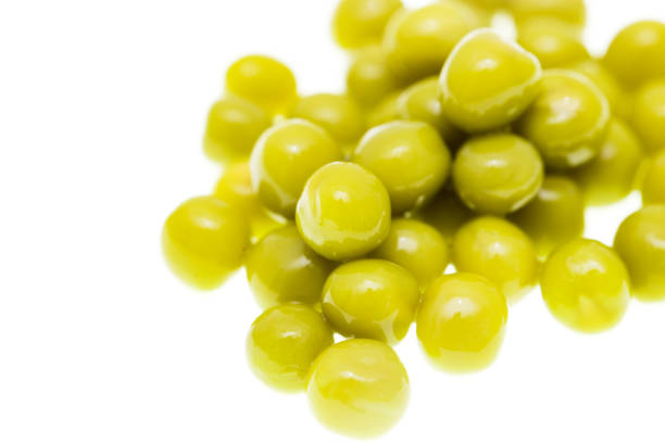 istock Pickled green peas isolated on white background 696636536