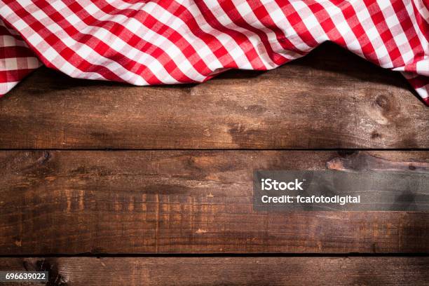 Checkered Tablecloth On Rustic Wooden Table Stock Photo - Download Image Now - Checked Pattern, Tablecloth, Napkin