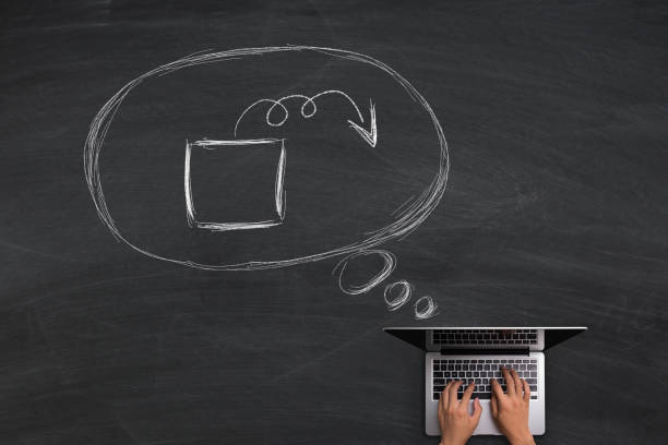 istock Think Outside The Box Concept With Laptop On Blackboard 696640312