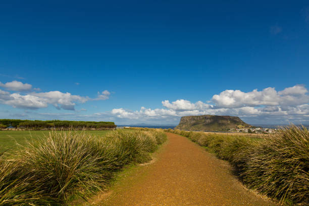 beautiful flat pathway leading to the nut lookout. the nut is an old volcanic plug of basalt in tasmania australia - solidified imagens e fotografias de stock