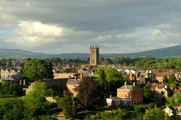 Ludlow, England View over the town of Ludlow, with the Shropshire hills in the background and the church tower the focal point of the picture ludlow shropshire stock pictures, royalty-free photos & images