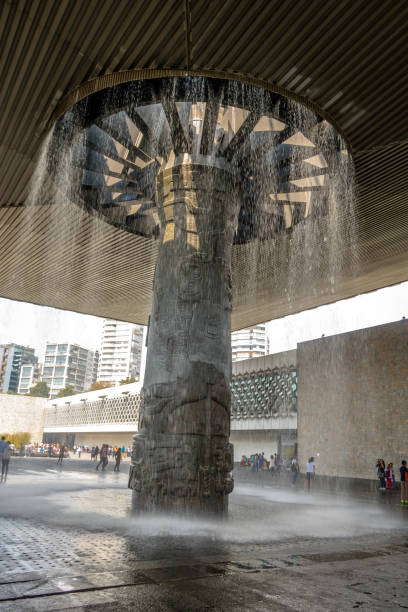 Waterfall of The National Museum of Anthropology (Museo Nacional de Antropologia, MNA) - Mexico City, Mexico MEXICO CITY, MEXICO - Oct 15, 2016: Waterfall of The National Museum of Anthropology (Museo Nacional de Antropologia, MNA) - Mexico City, Mexico museo stock pictures, royalty-free photos & images