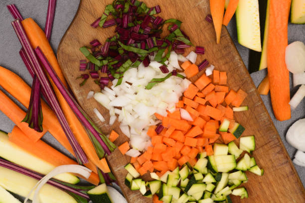 istock chopped vegetables on wooden board 696654294