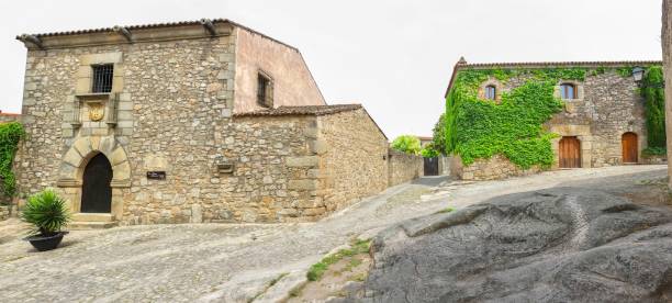 Street with Francisco Pizarro Family House Trujillo, Spain - June 4, 2017: Street with Francisco Pizarro Family House in Trujillo, Spain. conquistador who led an expedition that conquered the Inca Empire francisco pizarro stock pictures, royalty-free photos & images