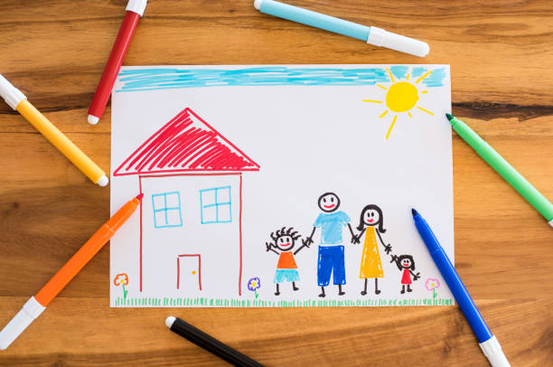 Happy family with children drawing