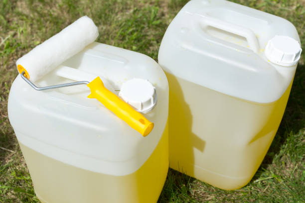 istock Two cans of a yellow anticeptic 696670214