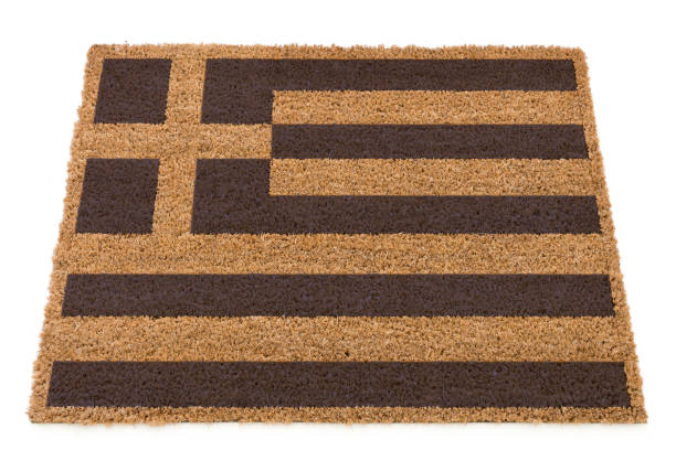 istock Greek Flag on a doormat 696673582