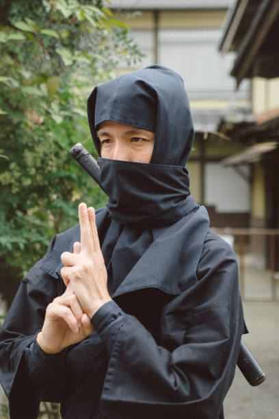 istock Ninja warrior in a traditional Japanese village 696673966