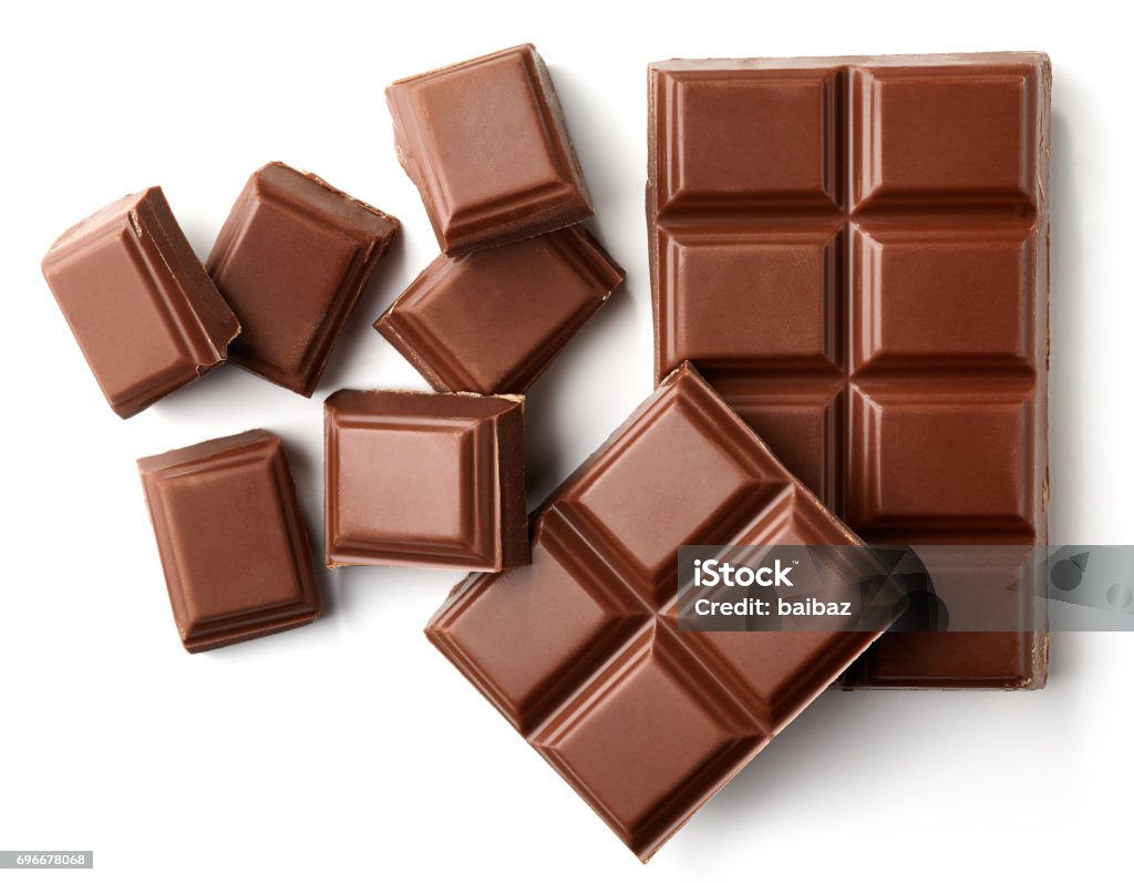 Milk chocolate pieces Milk chocolate pieces isolated on white background from top view Chocolate Bar Stock Photo