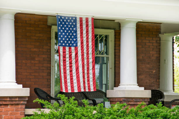 istock American flag on house porch 696681926