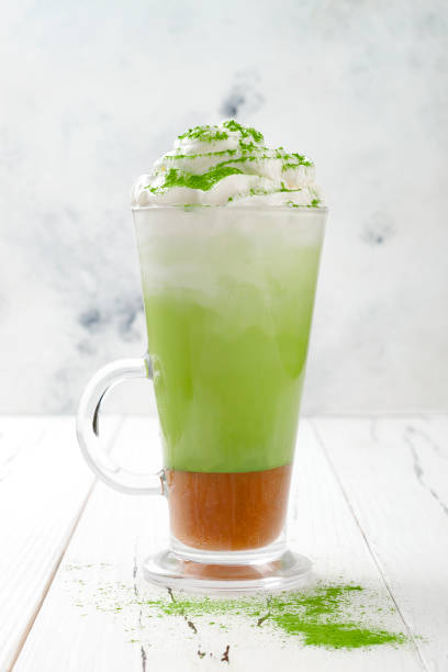 istock Matcha latte with salted caramel in tall glass. 696690058