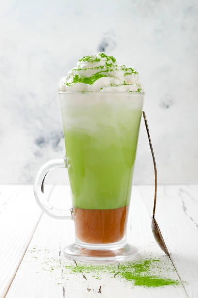 istock Matcha latte with salted caramel in tall glass. 696690130