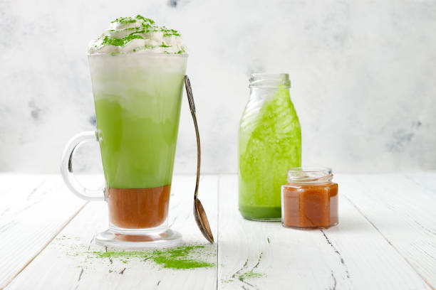 istock Matcha latte with salted caramel in tall glass. 696690156