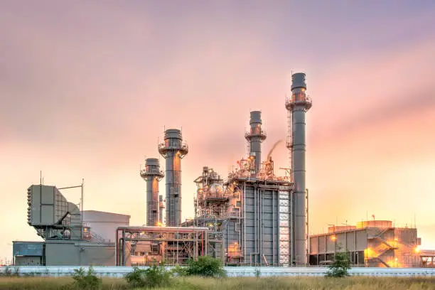 Photo of electric power plant during sunset time