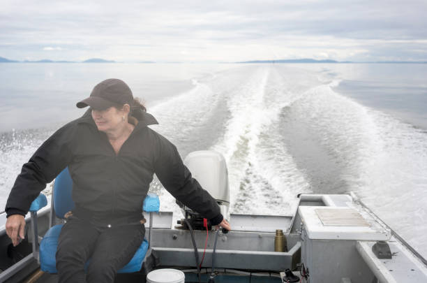 istock Woman on her boat 696694394