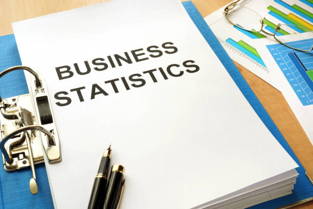 istock Folder with title Business Statistics in an office. 696696924