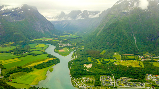 Andalsnes, Norway - June 17, 2014: Norway landscape. Romsdal fjord, Rauma river and Romsdal mountains. Andalsnes.view from Nesaksla viewpoint.