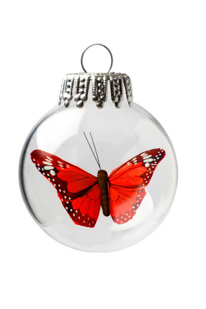 istock Butterfly in a Christmas Ornament 696704688