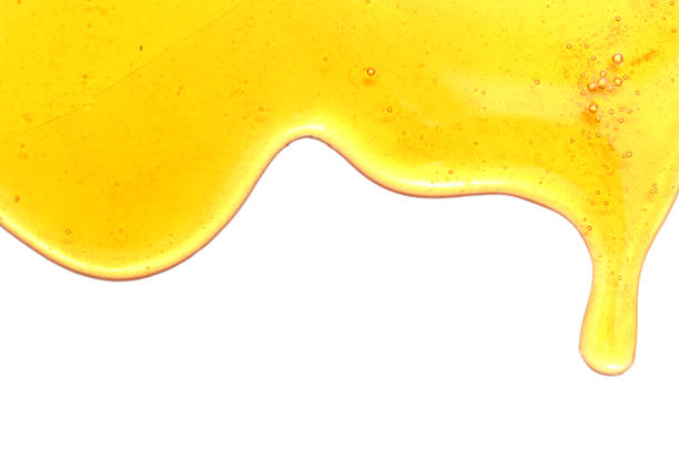 istock Sweet honey isolated on white background 696712452