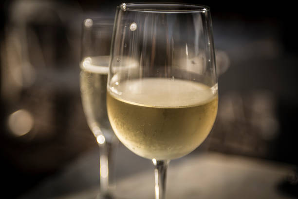 istock White wine with champagne in background 696719586