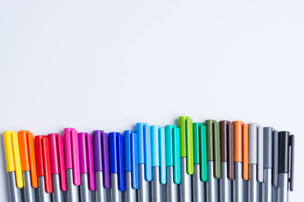 Many color fine liners in line isolated on white background