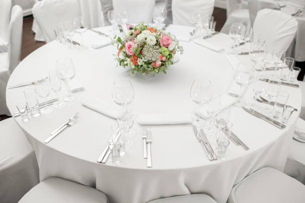 istock Round restaurant table served luxury for a festive dinner 696745218