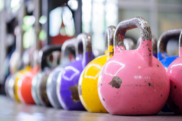 istock colorful kettlebells in a row in a gym 696746714