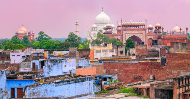 Old town of Agra with Taj Mahal, India Old town of Agra with Taj Mahal in background on sunset, Agra, India agra stock pictures, royalty-free photos & images