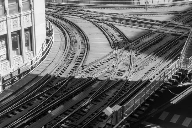 istock Black and white railroad tracks view from the above 696756572