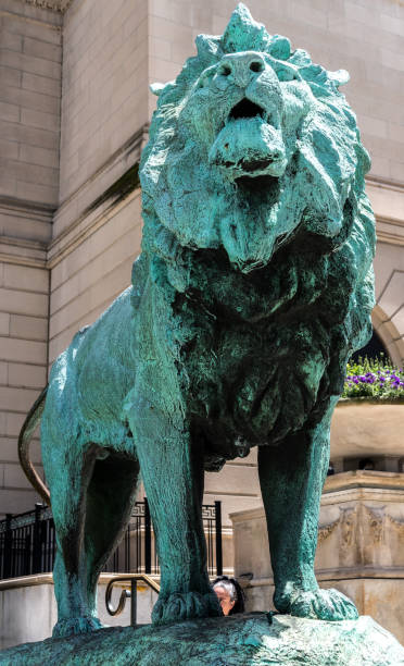 istock Blue lion monument in a downtown of Chicago 696756708