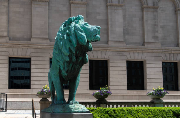 istock Blue lion monument in a downtown of Chicago 696756734
