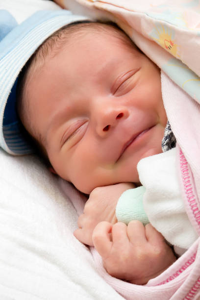 istock Baby smile in dreams 696756872