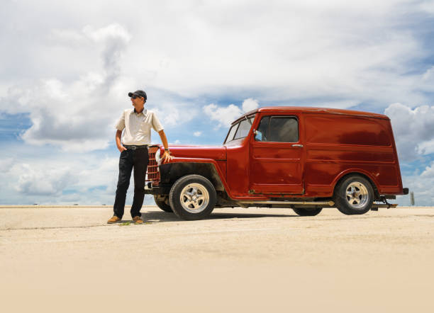 istock Man with vintage truck 696763056