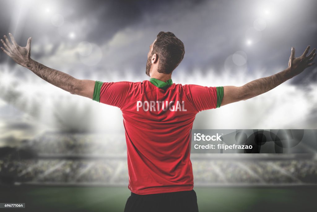 Portuguese Fan / Sport Player on uniform celebrating Sport Collection Soccer Stock Photo
