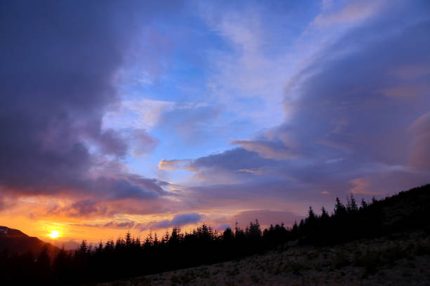 istock very colorful sunset in the mountains 696773652