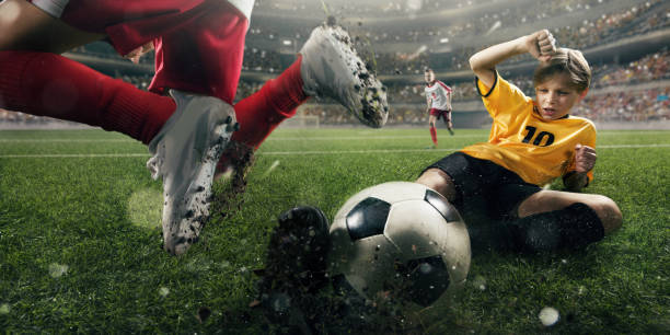 istock Soccer kids players in action in 3D dramatic stadium 696784728