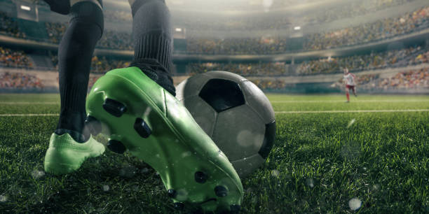 istock Close up soccer kids player with ball 696784734