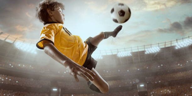 istock Soccer kids player in action in 3D dramatic stadium 696784738