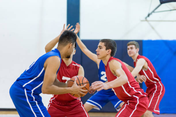 istock Boys high school basketball team: 696785000