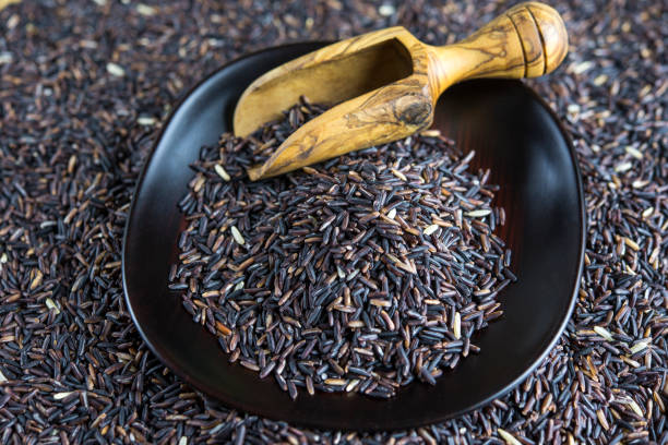 istock Black rice and handmade wood crafts 696794318