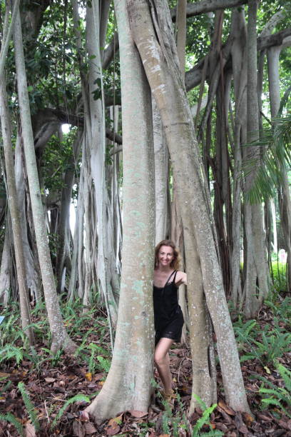 istock Woman in the tropical rainforest. 696796846