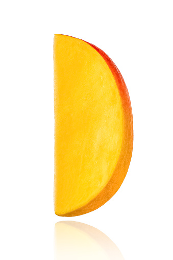 Piece of mango, slice, isolated on white background with drop shadow.