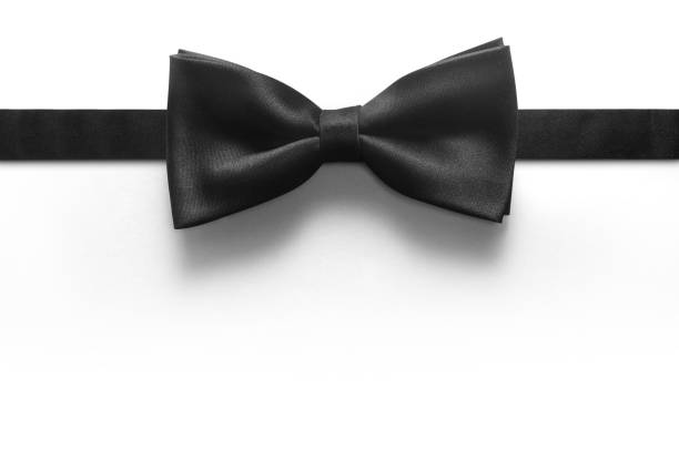 corbata de moño aislado sobre fondo blanco - formal fotografías e imágenes de stock