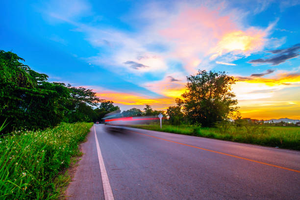 istock Landscape of rural road at dusk 696802586