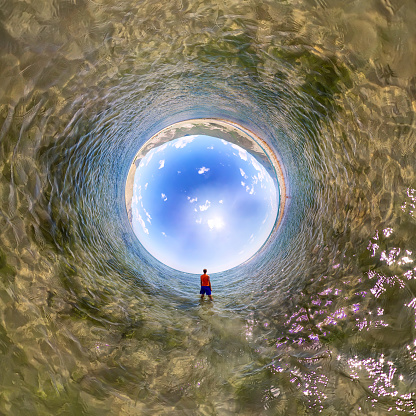 Spherical panorama 360 180 man standing in the sea.