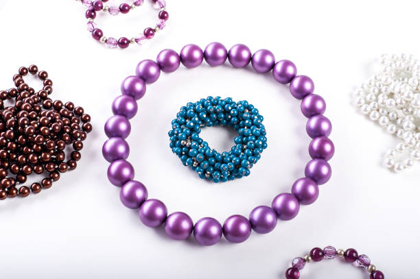 Women's beaded necklace from round colorful pearl beads isolated on white background. Female accessories.