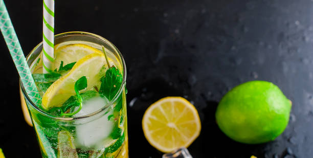 istock mojito cocktail wits lemons, limes and mint 696850636