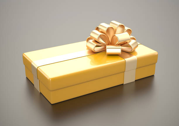 istock Yellow gift with gold ribbon 696850690