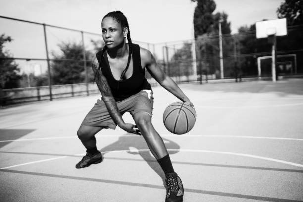 istock Fierce female basketball player 696861756